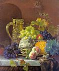 Fruits on a tray with a silver flagon on a marble ledge